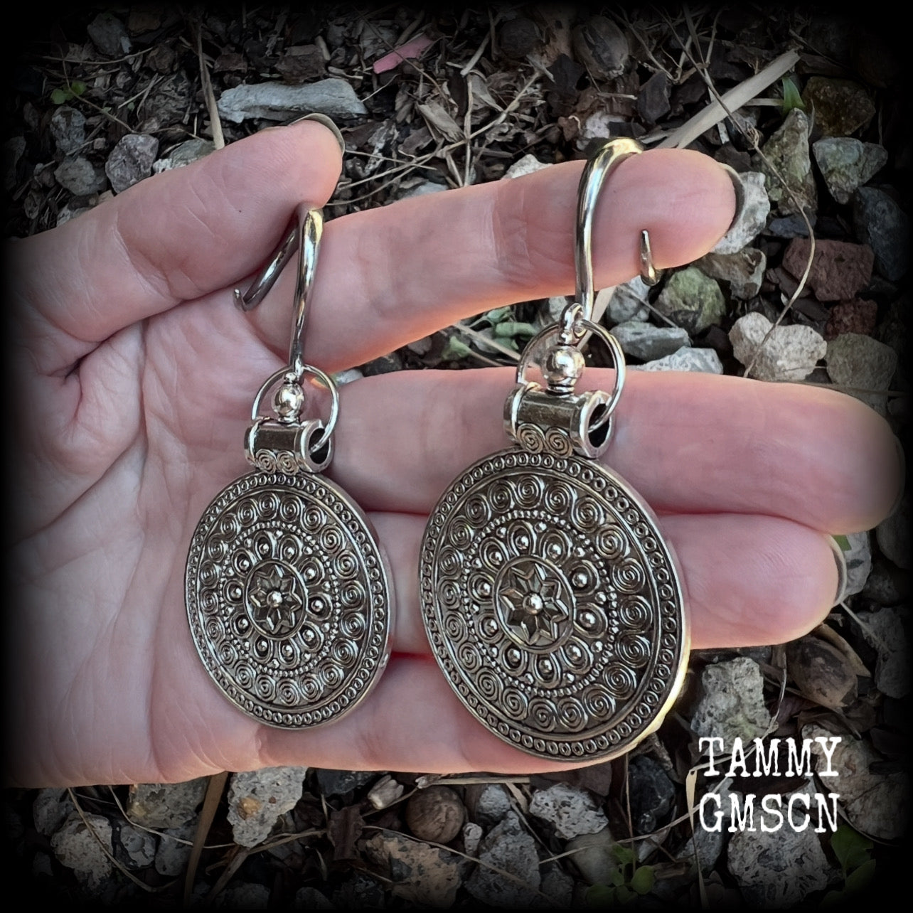 These gorgeous antique silver mandala gauged earrings are nice and light weight, weighing approx 11 grams a piece, measuring approx 7.5cms from tip to tip.

This pair have been made on 6 gauge (4mm) surgical steel full curl hooks, suitable for stretched lobes.