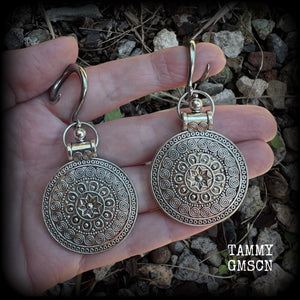 These gorgeous antique silver mandala gauged earrings are nice and light weight, weighing approx 11 grams a piece, measuring approx 7.5cms from tip to tip.

This pair have been made on 6 gauge (4mm) surgical steel full curl hooks, suitable for stretched lobes.