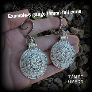 These gorgeous antique silver mandala gauged earrings are nice and light weight, weighing approx 11 grams a piece, measuring approx 7.5cms from tip to tip.

This pair have been made on 6 gauge (4mm) surgical steel full curl hooks, suitable for stretched lobes.