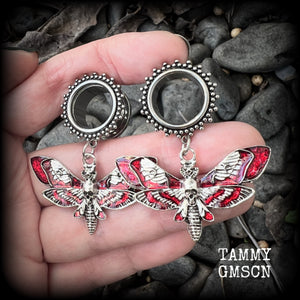 These awesome tunnel earrings feature antique silver and red enamel deathshead moths, are nice and light weight, weighing in at 10 grams each and measure just over 5cms from tip to tip.

This pair have been made with 5/8” gauge (16mm) surgical steel screw fit ornate tunnels.