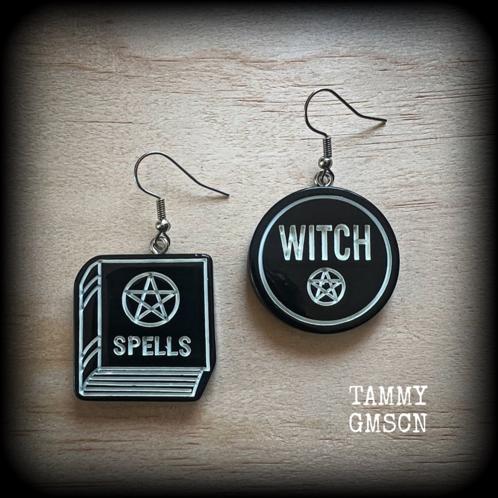 These awesome earrings feature light weight black and white witchy spell book and witchy pentagram charms, are super lightweight at only a few grams each, and are nice and dangly, measuring approx 5cms from tip to tip.

This pair has made on stainless steel french hooks, suitable for pierced ears or stretched lobes.

