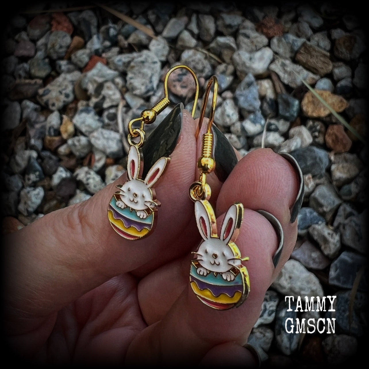 Super cute and super light weight, these adorable earrings feature colourful enamel and antique gold bunny rabbit and easter egg charms.

Measuring just under 4cms from tip to tip and weighing only a gram or two each, this pair has been made with french hooks-for pierced ears.