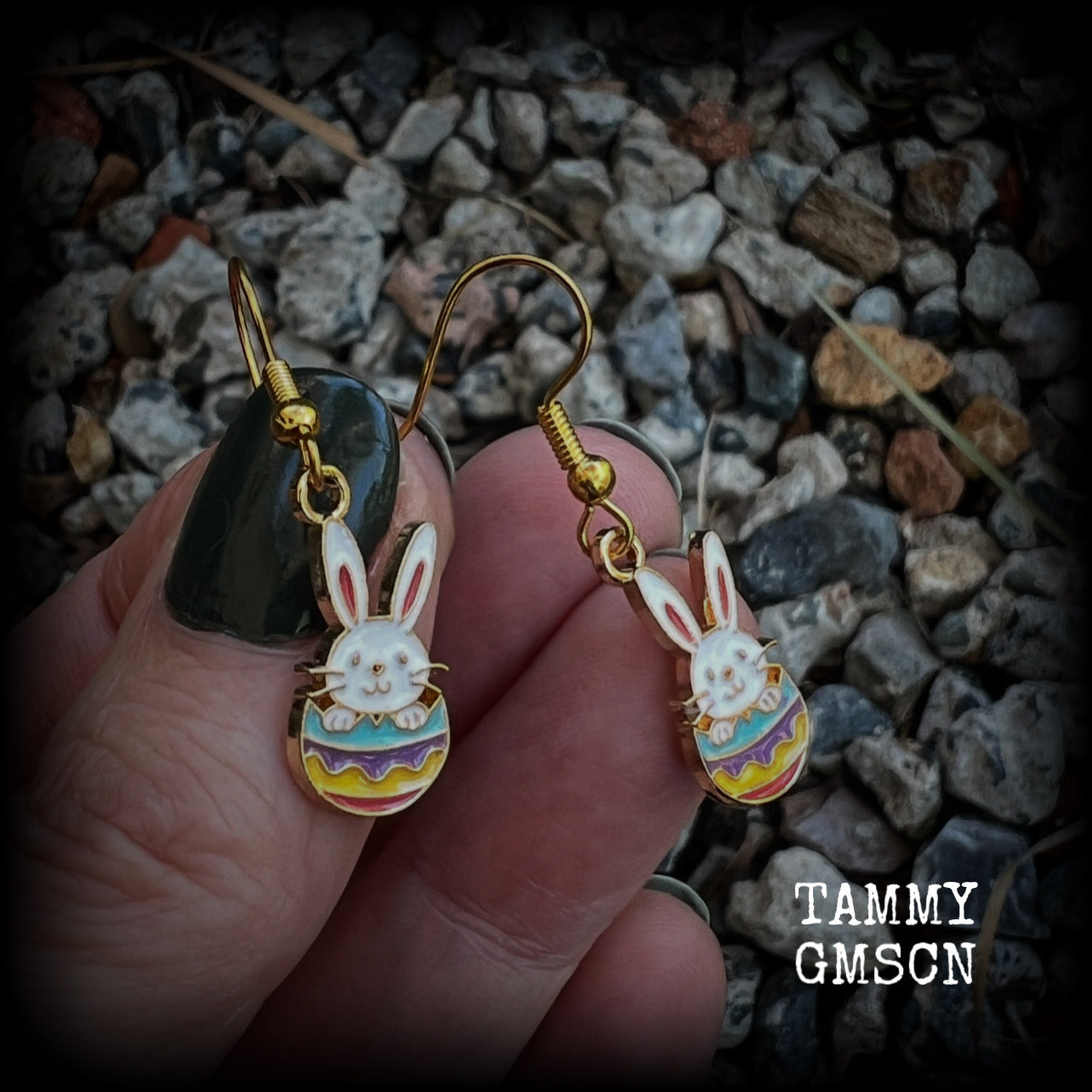 Super cute and super light weight, these adorable earrings feature colourful enamel and antique gold bunny rabbit and easter egg charms.

Measuring just under 4cms from tip to tip and weighing only a gram or two each, this pair has been made with french hooks-for pierced ears.