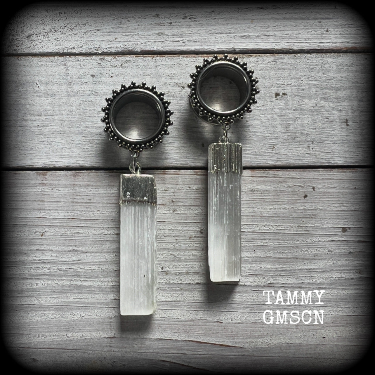 These unique earrings have been made with beautiful rustic Selenite pieces, weighing approx 15grams each and measure just over 7cms from tip to tip.

This pair has been made with 5/8" (16mm) gauge ornate surgical steel screw fit tunnels.