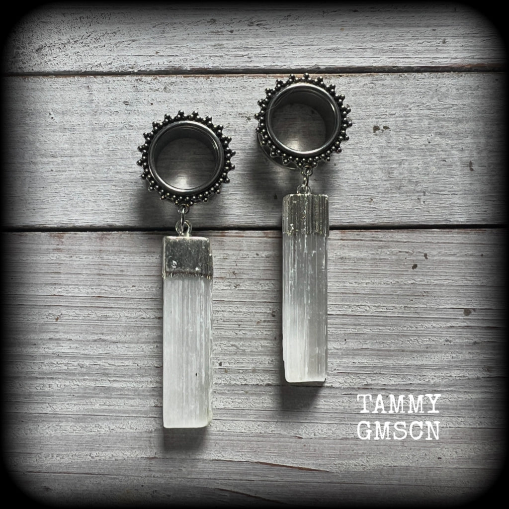 These unique earrings have been made with beautiful rustic Selenite pieces, weighing approx 15grams each and measure just over 7cms from tip to tip.

This pair has been made with 5/8" (16mm) gauge ornate surgical steel screw fit tunnels.
