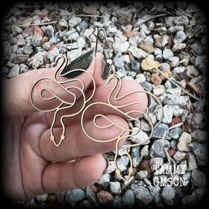 These earrings feature a gorgeous coiled stainless steel snake, measuring 6cms from tip to tip, and super lightweight at only a few grams each.  This pair have been made with stainless steel french hooks, suitable for pierced ears.