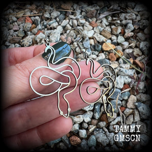 These earrings feature a gorgeous coiled stainless steel snake, measuring 6cms from tip to tip, and super lightweight at only a few grams each.  This pair have been made with stainless steel french hooks, suitable for pierced ears.