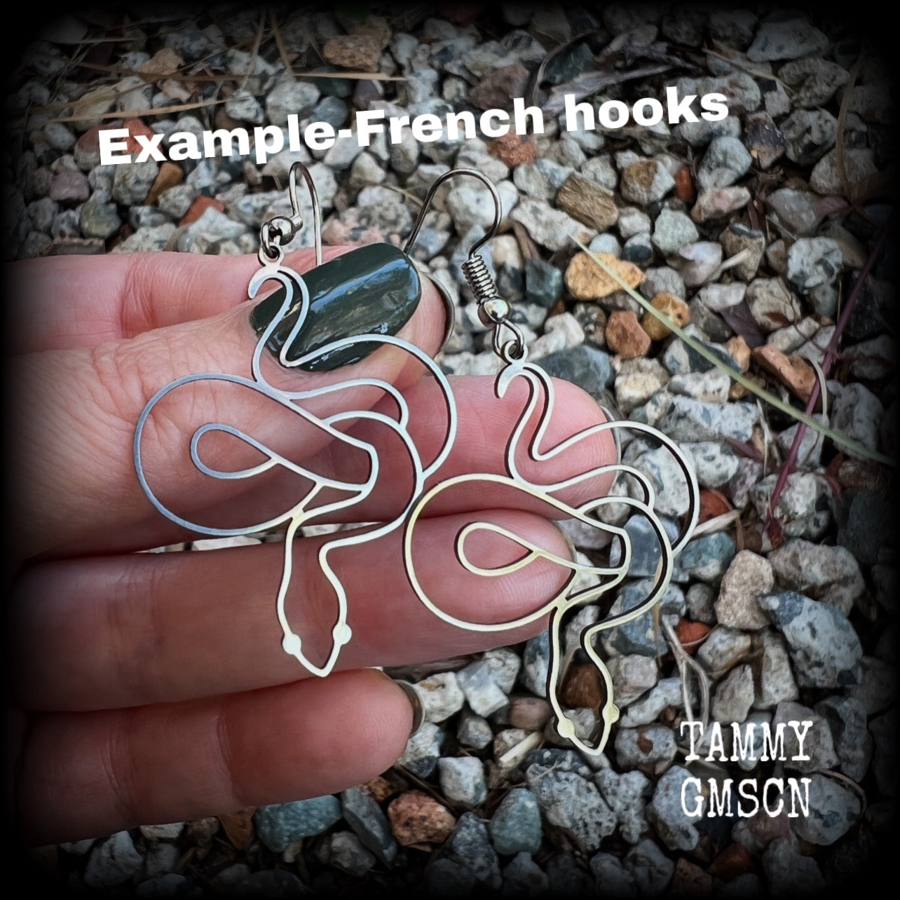 These earrings feature a gorgeous coiled stainless steel snake, measuring 6cms from tip to tip, and super lightweight at only a few grams each.  This pair have been made with stainless steel french hooks, suitable for pierced ears.