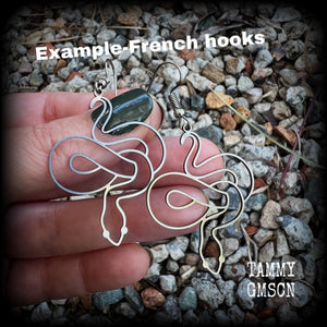 These earrings feature a gorgeous coiled stainless steel snake, measuring 6cms from tip to tip, and super lightweight at only a few grams each.  This pair have been made with stainless steel french hooks, suitable for pierced ears.