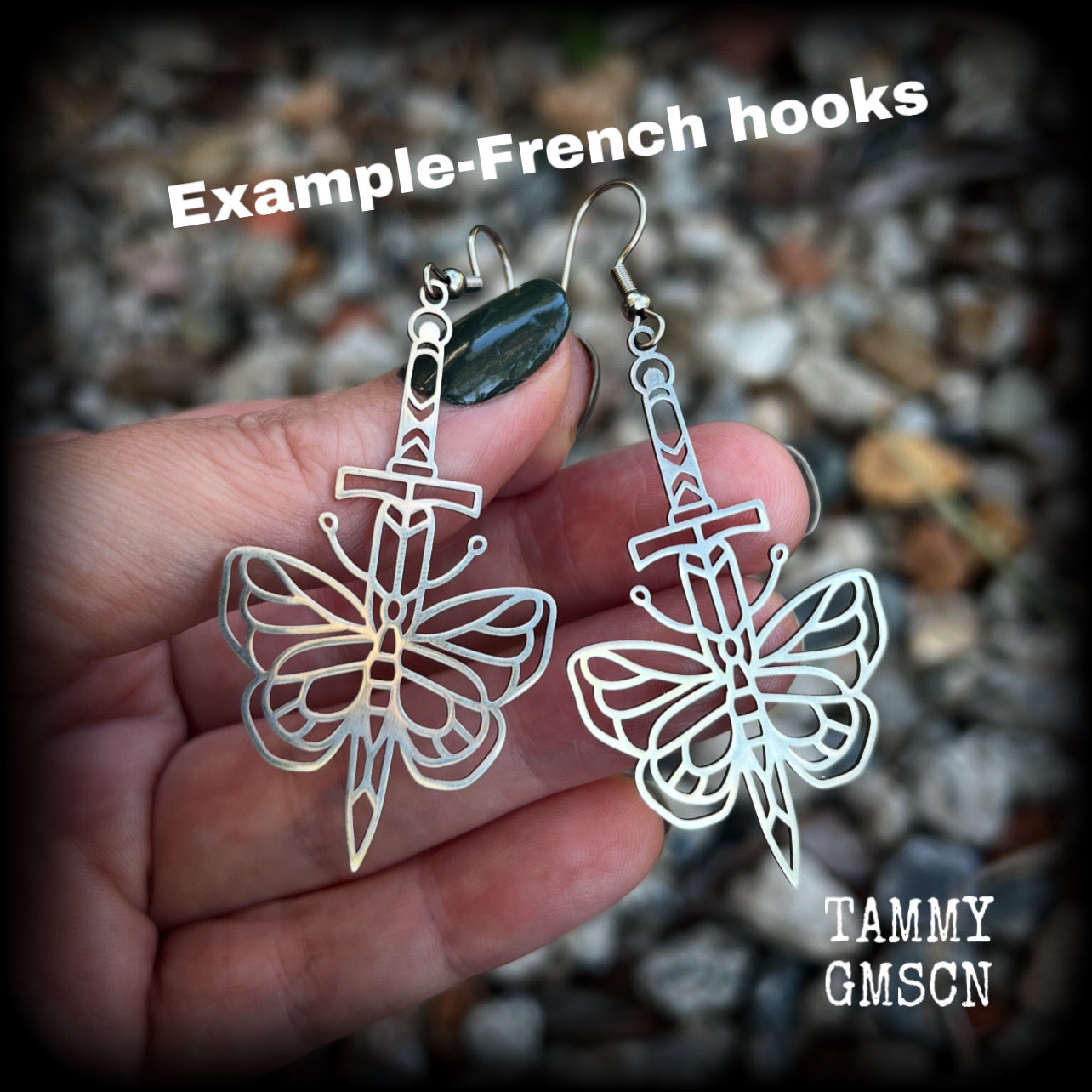 This pair of stainless steel earrings features a classic punk butterfly and dagger tattoo design, measuring just on 7cms from tip to tip, and weighing only a grams or two each.

This pair has been made on stainless steel french hooks, suitable for pierced ears.