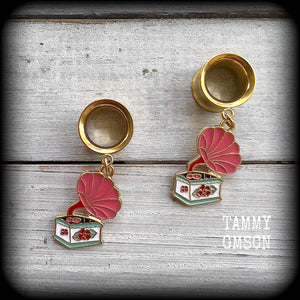 These cute little earrings have been made with pink and gold enamel gramophone charms, weighing only 5 grams each and measuring approx 4cms from tip to tip.

This pair has been made with 1/2" gauge (12mm) surgical steel screw fit earlets, for stretched lobes.