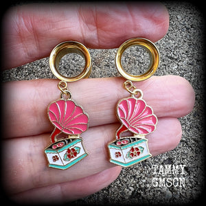 These cute little earrings have been made with pink and gold enamel gramophone charms, weighing only 5 grams each and measuring approx 4cms from tip to tip.

This pair has been made with 1/2" gauge (12mm) surgical steel screw fit earlets, for stretched lobes.