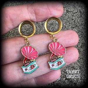 These cute little earrings have been made with pink and gold enamel gramophone charms, weighing only 5 grams each and measuring approx 4cms from tip to tip.

This pair has been made with 1/2" gauge (12mm) surgical steel screw fit earlets, for stretched lobes.