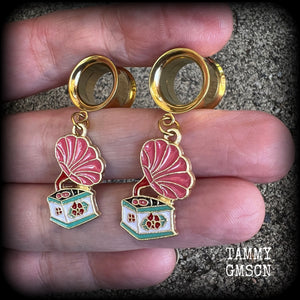 These cute little earrings have been made with pink and gold enamel gramophone charms, weighing only 5 grams each and measuring approx 4cms from tip to tip.

This pair has been made with 1/2" gauge (12mm) surgical steel screw fit earlets, for stretched lobes.