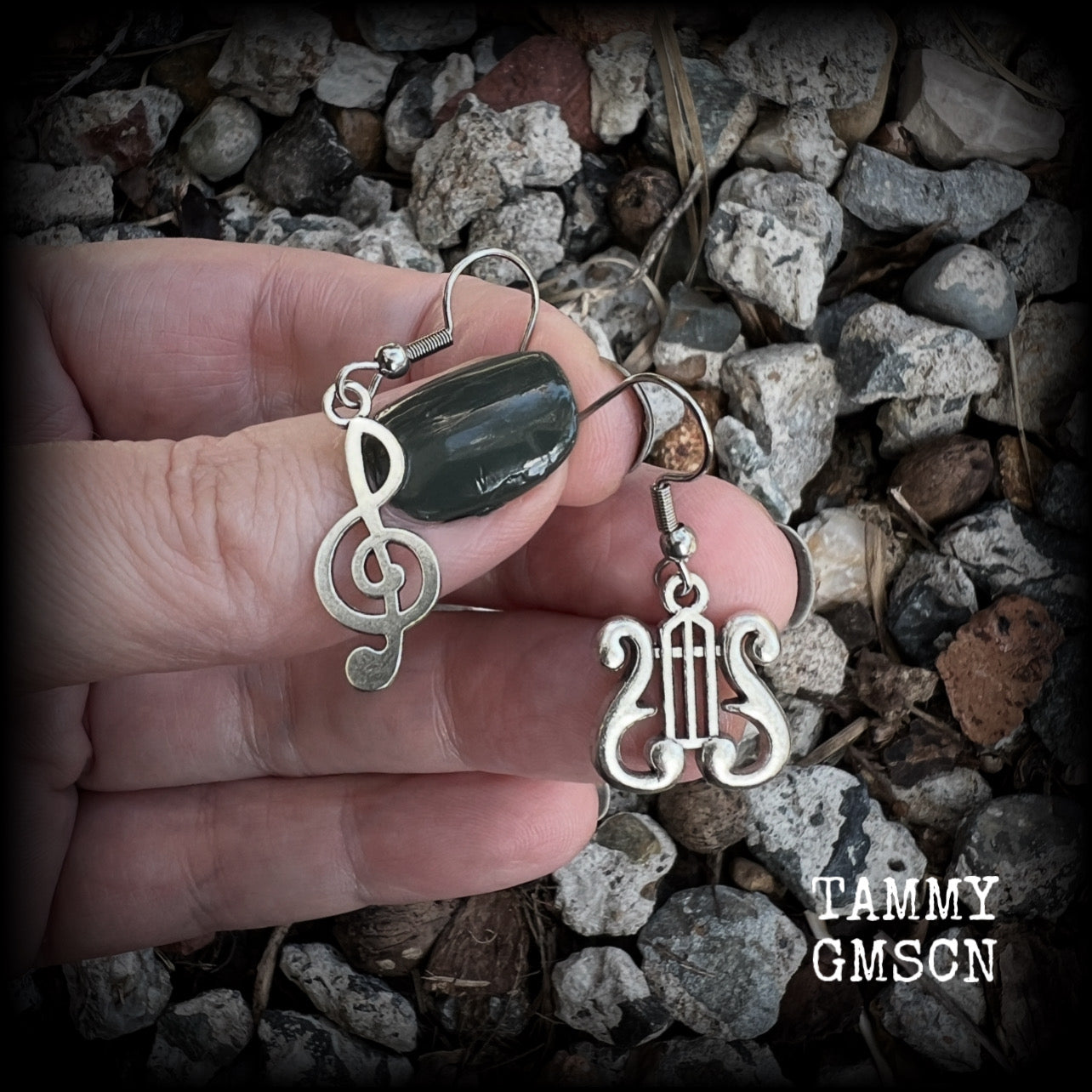This awesome pair of earrings features antique silver treble clef with a vintage lyre music stand charm, are nice and lightweight weighing only a few grams each, and measure approx 4cms from tip to tip.

This pair has been made on stainless steel french hooks, suitable for pierced ears.

