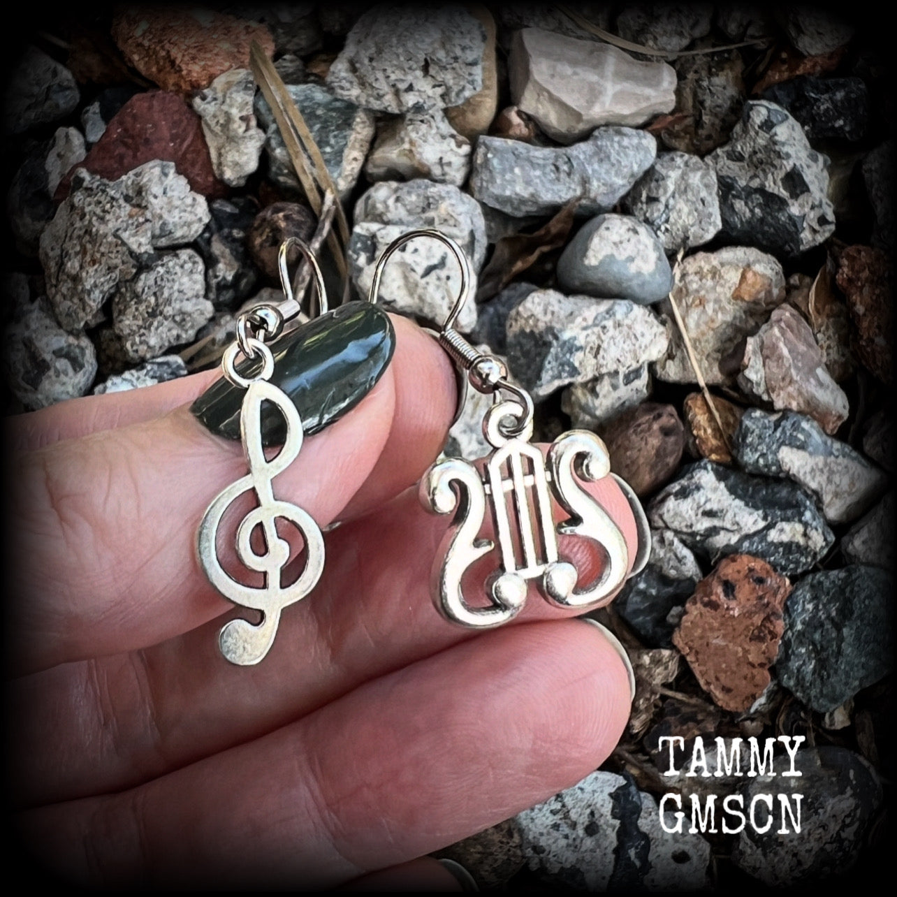 This awesome pair of earrings features antique silver treble clef with a vintage lyre music stand charm, are nice and lightweight weighing only a few grams each, and measure approx 4cms from tip to tip.

This pair has been made on stainless steel french hooks, suitable for pierced ears.

