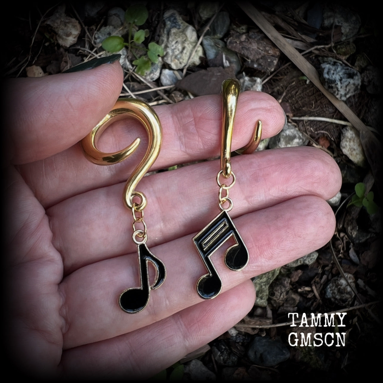 These awesome gauged earrings feature gorgeous antique gold and black enamel music notes, not too heavy at approx 8 grams a piece, and nice and dangly at just on 6cms from tip to tip.

This pair has been made on 2 gauge (6mm) surgical steel full curl hooks, suitable for stretched lobes.