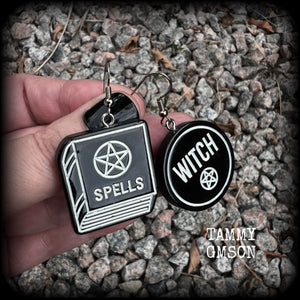 These awesome earrings feature light weight black and white witchy spell book and witchy pentagram charms, are super lightweight at only a few grams each, and are nice and dangly, measuring approx 5cms from tip to tip.  This pair has made on stainless steel french hooks, suitable for pierced ears or stretched lobes.