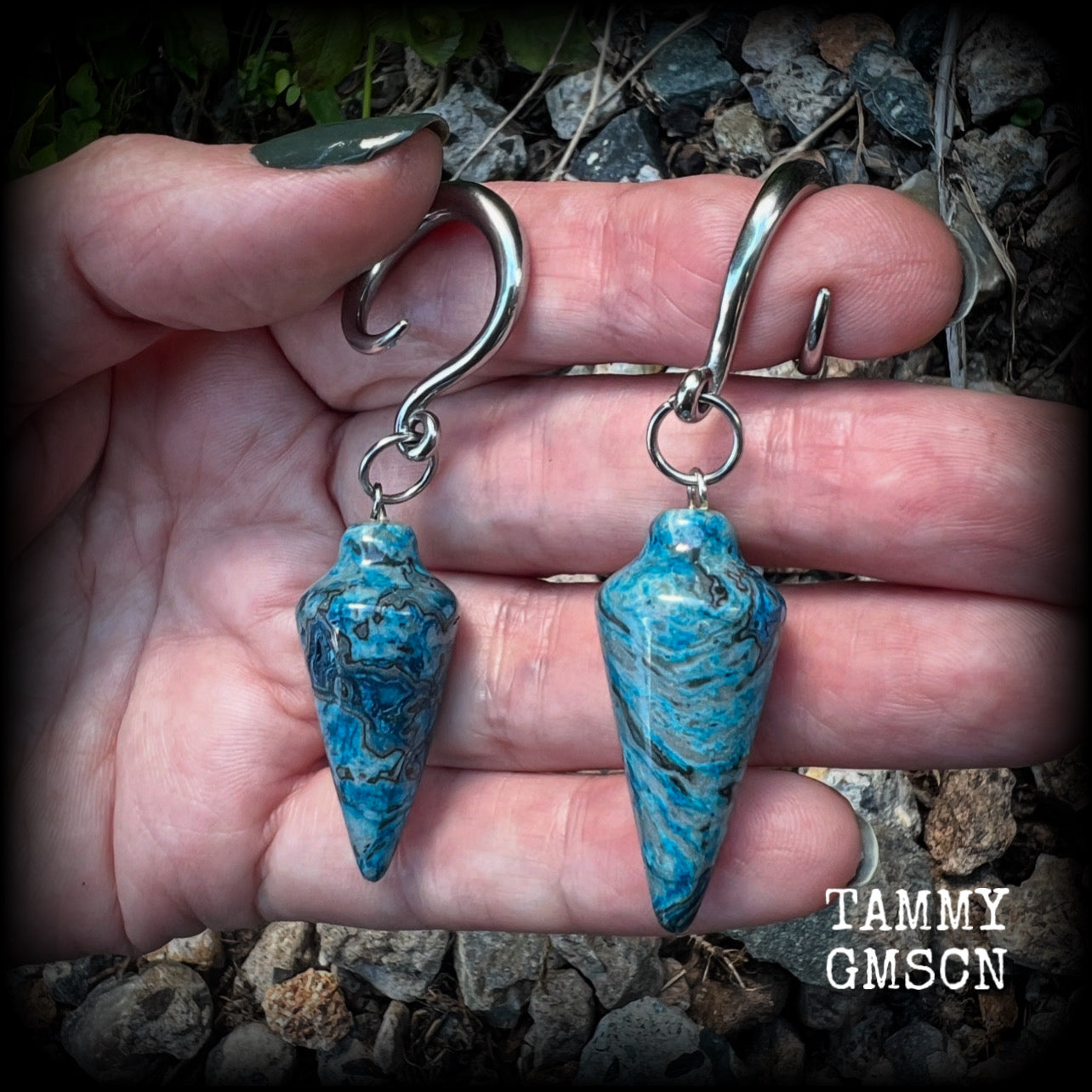 Featuring gorgeous one of a kind blue lace agate pendulums, these earrings weigh in at approx 11 grams a piece, and are nice and dangly at just on 7cms from tip to tip.

This pair has been made on 6 gauge (4mm) surgical steel full curl hooks, to be worn in stretched lobes.