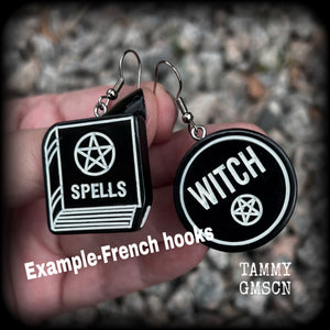 These awesome earrings feature light weight black and white witchy spell book and witchy pentagram charms, are super lightweight at only a few grams each, and are nice and dangly, measuring approx 5cms from tip to tip.  This pair has made on stainless steel french hooks, suitable for pierced ears or stretched lobes.