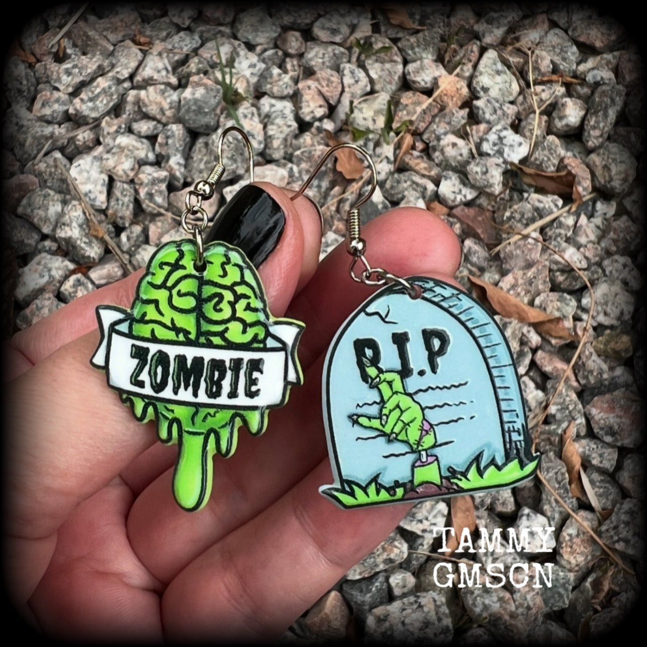 These awesome zombie movie inspired earrings feature light weight green and grey acrylic zombie brains and tombstone charms, are super lightweight at only a few grams each, and are nice and dangly, measuring just under 6cms from tip to tip.  This pair has made on stainless steel french hooks, suitable for pierced ears or stretched lobes.
