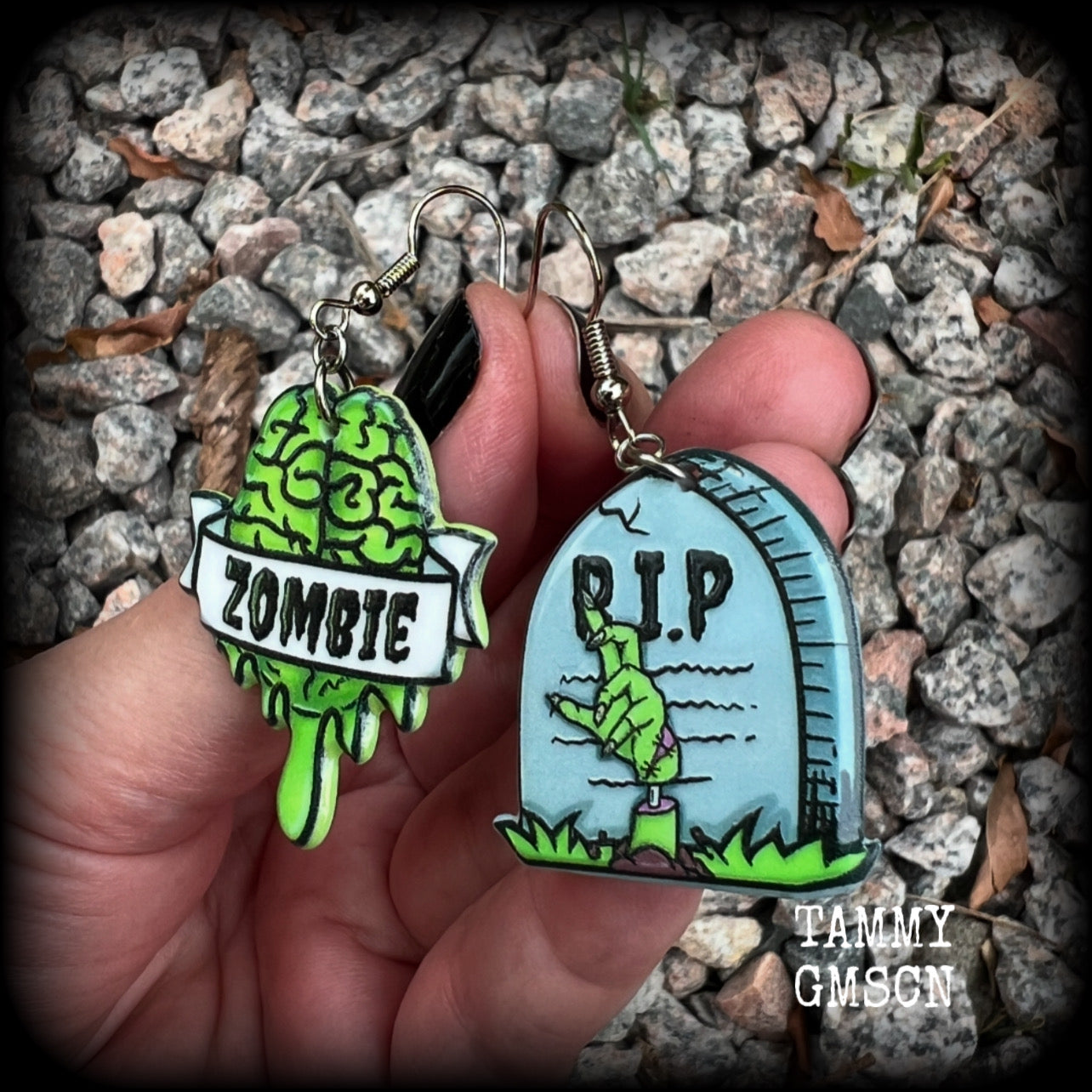These awesome zombie movie inspired earrings feature light weight green and grey acrylic zombie brains and tombstone charms, are super lightweight at only a few grams each, and are nice and dangly, measuring just under 6cms from tip to tip.  This pair has made on stainless steel french hooks, suitable for pierced ears or stretched lobes.