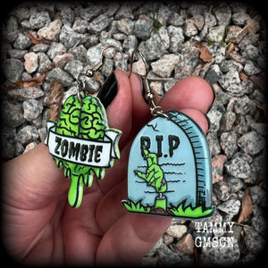 These awesome zombie movie inspired earrings feature light weight green and grey acrylic zombie brains and tombstone charms, are super lightweight at only a few grams each, and are nice and dangly, measuring just under 6cms from tip to tip.  This pair has made on stainless steel french hooks, suitable for pierced ears or stretched lobes.