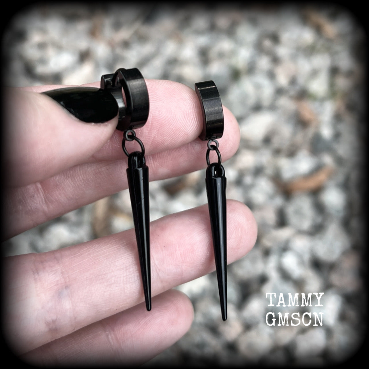 These awesome black acrylic spike earrings are nice and dangly, measuring just over 5 cms from tip to tip and weighing only a few grams each, super light weight.  This pair has been made with stainless steel huggies, to be worn in pierced ears.