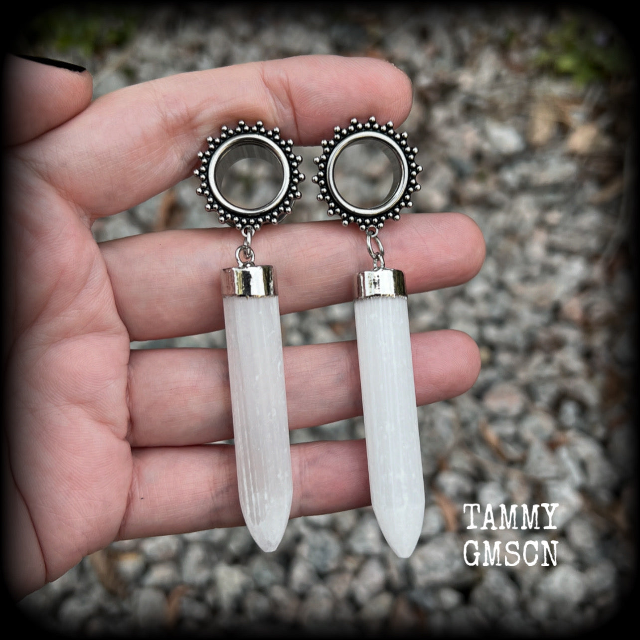 These unique earrings have been made with beautiful rustic Selenite points, weighing approx 15grams each and measuring approx 8.5cms from tip to tip.  This pair has been made with 9/16" (14mm) gauge ornate surgical steel screw fit tunnels.