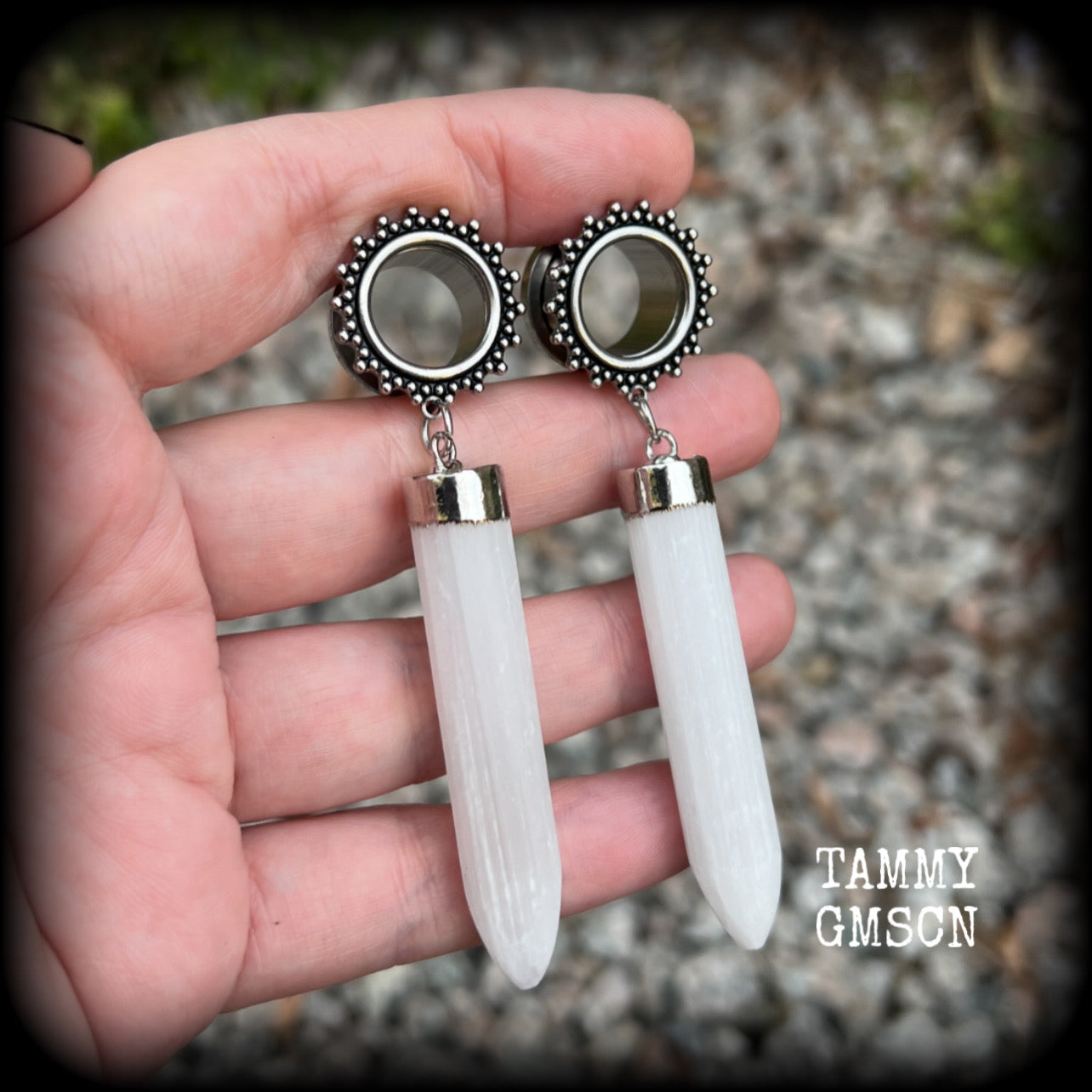 These unique earrings have been made with beautiful rustic Selenite points, weighing approx 15grams each and measuring approx 8.5cms from tip to tip.  This pair has been made with 9/16" (14mm) gauge ornate surgical steel screw fit tunnels.