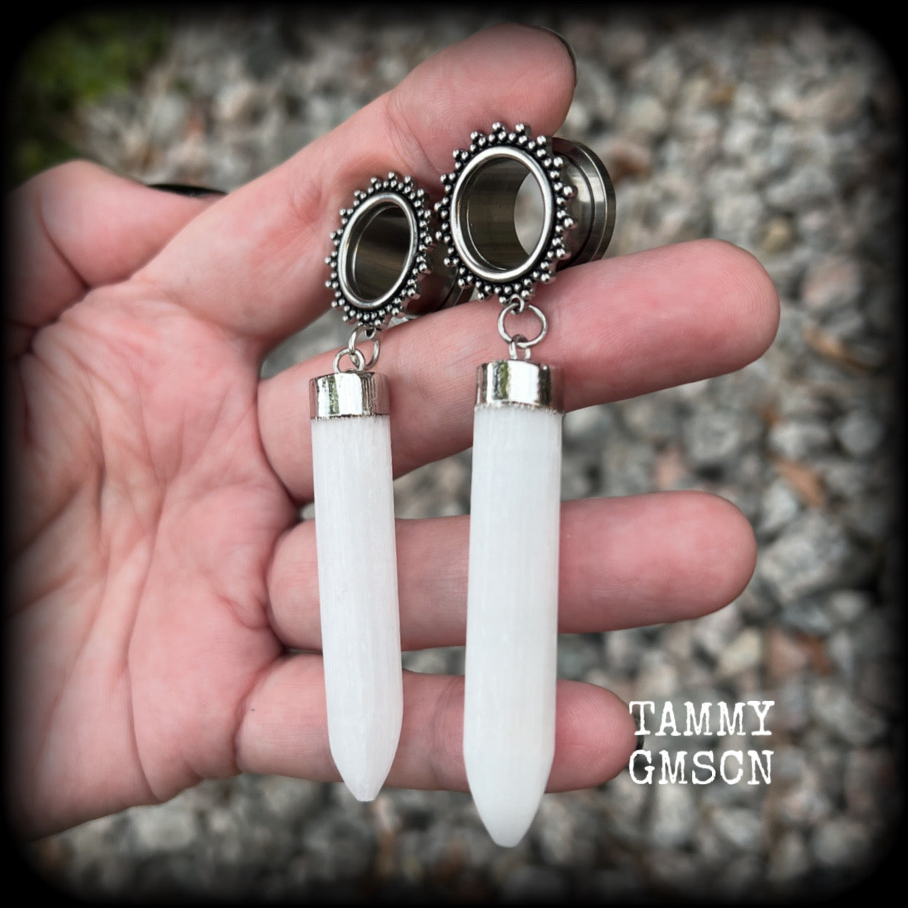 These unique earrings have been made with beautiful rustic Selenite points, weighing approx 15grams each and measuring approx 8.5cms from tip to tip.  This pair has been made with 9/16" (14mm) gauge ornate surgical steel screw fit tunnels.