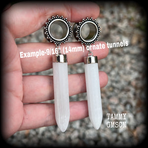 These unique earrings have been made with beautiful rustic Selenite points, weighing approx 15grams each and measuring approx 8.5cms from tip to tip.  This pair has been made with 9/16" (14mm) gauge ornate surgical steel screw fit tunnels.