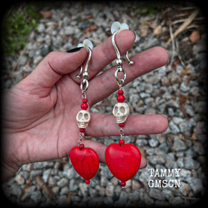 This pair of beautiful earrings features gorgeous big blood red stone hearts with bone white howlite stone skulls, measuring just under 12cm from tip to tip and weighing 18 grams each, these are nice and dangly.  This pair have been made with large antique silver shephard hooks, suitable for stretched lobes when worn with silicone earlets from 2 gauge (6mm).