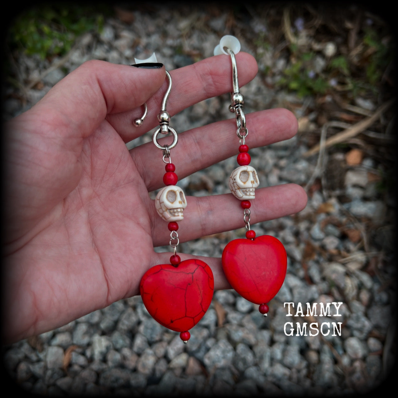 This pair of beautiful earrings features gorgeous big blood red stone hearts with bone white howlite stone skulls, measuring just under 12cm from tip to tip and weighing 18 grams each, these are nice and dangly.  This pair have been made with large antique silver shephard hooks, suitable for stretched lobes when worn with silicone earlets from 2 gauge (6mm).