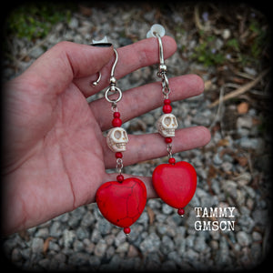 This pair of beautiful earrings features gorgeous big blood red stone hearts with bone white howlite stone skulls, measuring just under 12cm from tip to tip and weighing 18 grams each, these are nice and dangly.  This pair have been made with large antique silver shephard hooks, suitable for stretched lobes when worn with silicone earlets from 2 gauge (6mm).
