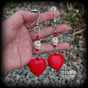 This pair of beautiful earrings features gorgeous big blood red stone hearts with bone white howlite stone skulls, measuring just under 12cm from tip to tip and weighing 18 grams each, these are nice and dangly.  This pair have been made with large antique silver shephard hooks, suitable for stretched lobes when worn with silicone earlets from 2 gauge (6mm).