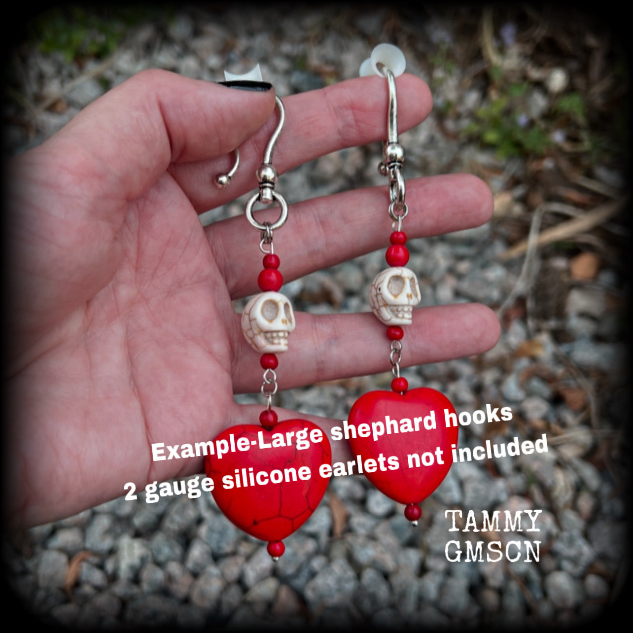This pair of beautiful earrings features gorgeous big blood red stone hearts with bone white howlite stone skulls, measuring just under 12cm from tip to tip and weighing 18 grams each, these are nice and dangly.  This pair have been made with large antique silver shephard hooks, suitable for stretched lobes when worn with silicone earlets from 2 gauge (6mm).