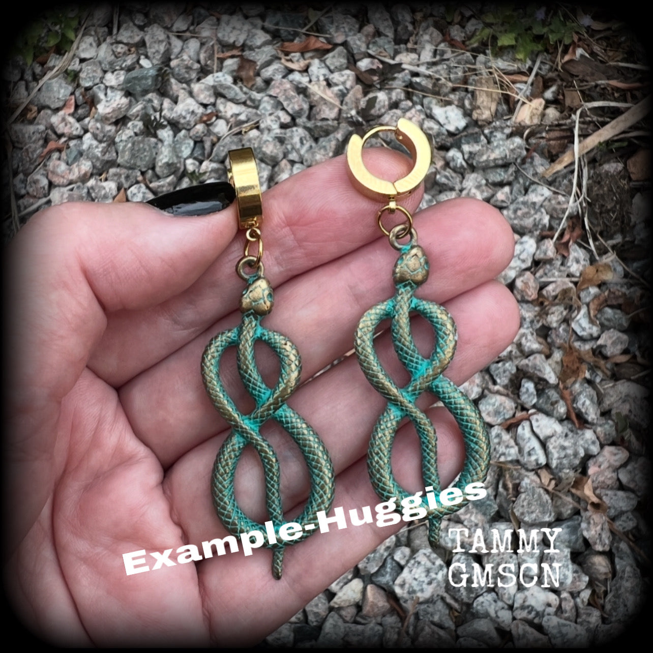 These awesome earrings feature antique bronze snake twisted into an infinity symbol, weighing in at 8 grams each, and measuring approx 7.5cms from tip to tip.  This pair have been made on stainless steel huggie ear cuffs, suitable for pierced ears.