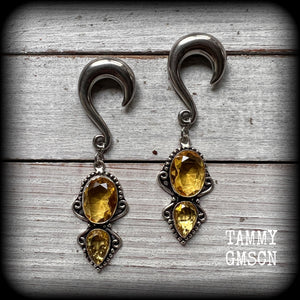 Made with gorgeous facet yellow citrine gemstones, lovely and dangly at just under 8 from tip to tip, and weighing approx 15 grams each.
These earrings have been made on 0 gauge (8mm) surgical steel half curl hooks, to be worn in stretched lobes.