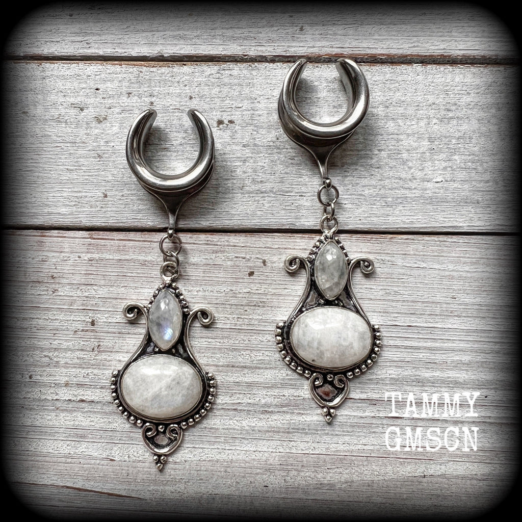 These beautiful boho Rainbow moonstone gauged earrings have been made with gorgeous polished gemstones in a beautiful boho antique silver setting, measuring just under 8cms from tip to tip, and weighing approx 11 grams each, nice and lightweight.

These earrings have been made on 5/8" gauge (16mm) surgical steel cradles, to be worn in stretched lobes.