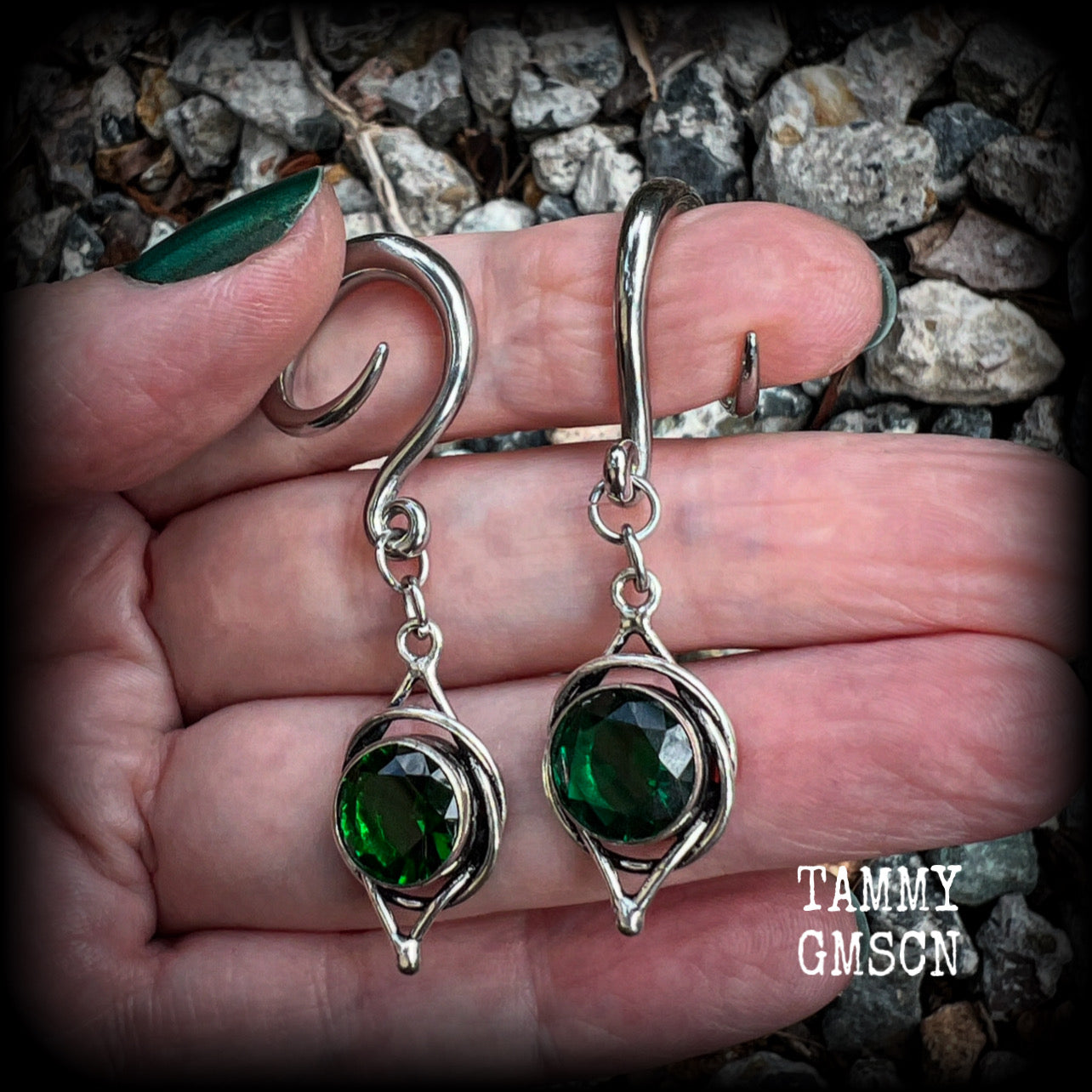 This pair of earrings features gorgeous green quartz gemstones in a beautiful antique silver setting knotwork setting, weighing approx 5 grams a piece and measuring just on 5.5cms from tip to tip.  This pair have been made on 6 gauge (4mm) surgical steel full curl hooks, to be worn in stretched lobes.