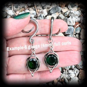 This pair of earrings features gorgeous green quartz gemstones in a beautiful antique silver setting knotwork setting, weighing approx 5 grams a piece and measuring just on 5.5cms from tip to tip.  This pair have been made on 6 gauge (4mm) surgical steel full curl hooks, to be worn in stretched lobes.