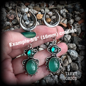 This pair of earrings features gorgeous green topaz and cats eye gemstones in a beautiful boho antique silver setting, weighing approx 10 grams a piece and measuring just over 7cms from tip to tip.  This pair have been made on 5/8” gauge (16mm) surgical steel cradles, to be worn in stretched lobes.