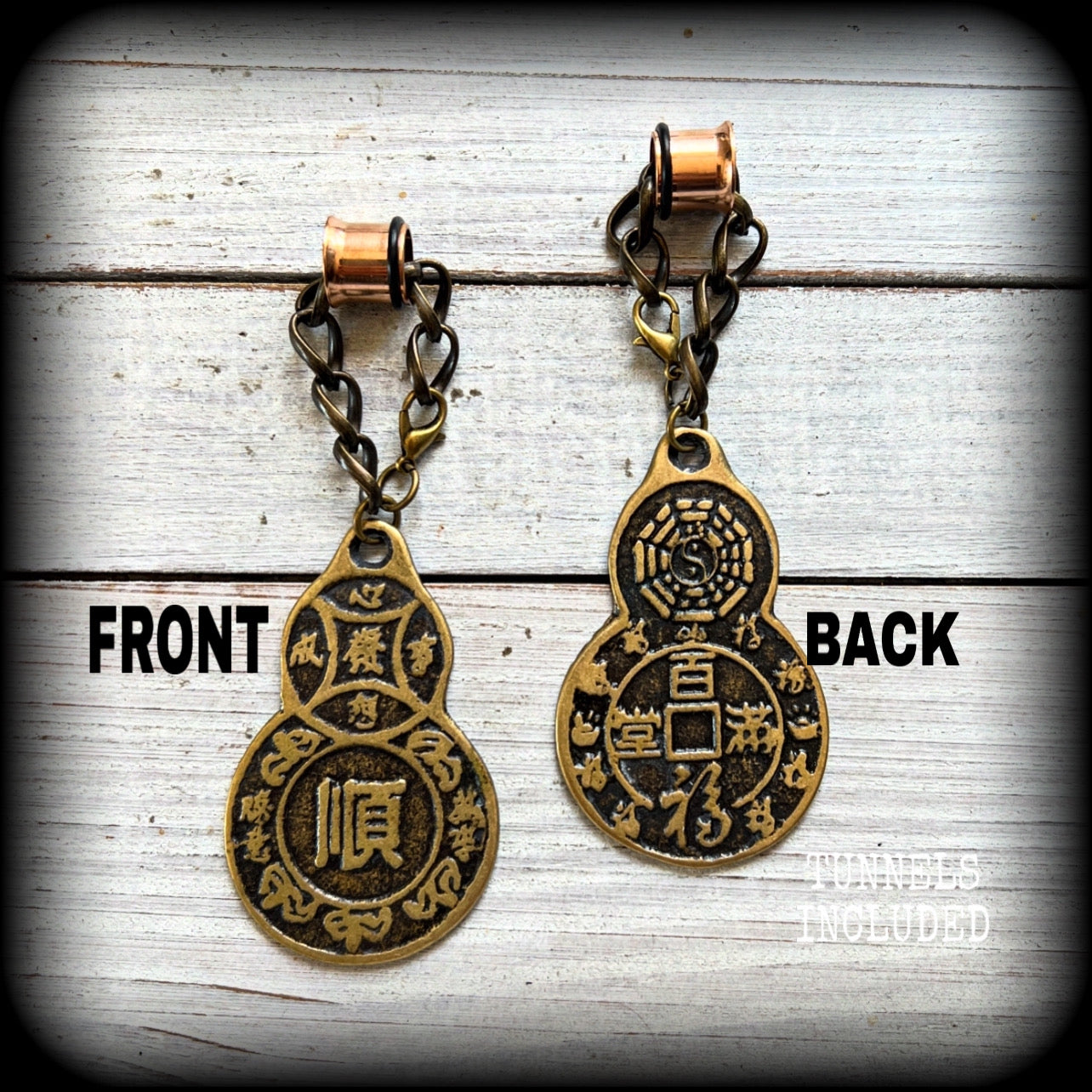 These unique brass chain ear weights feature gourd shaped Wu Lou pendants believed to be a symbol of good health, prosperity, and good luck in Chinese culture.

This pair weighs approx 20 grams each, and measuring 10cms from tip to tip.