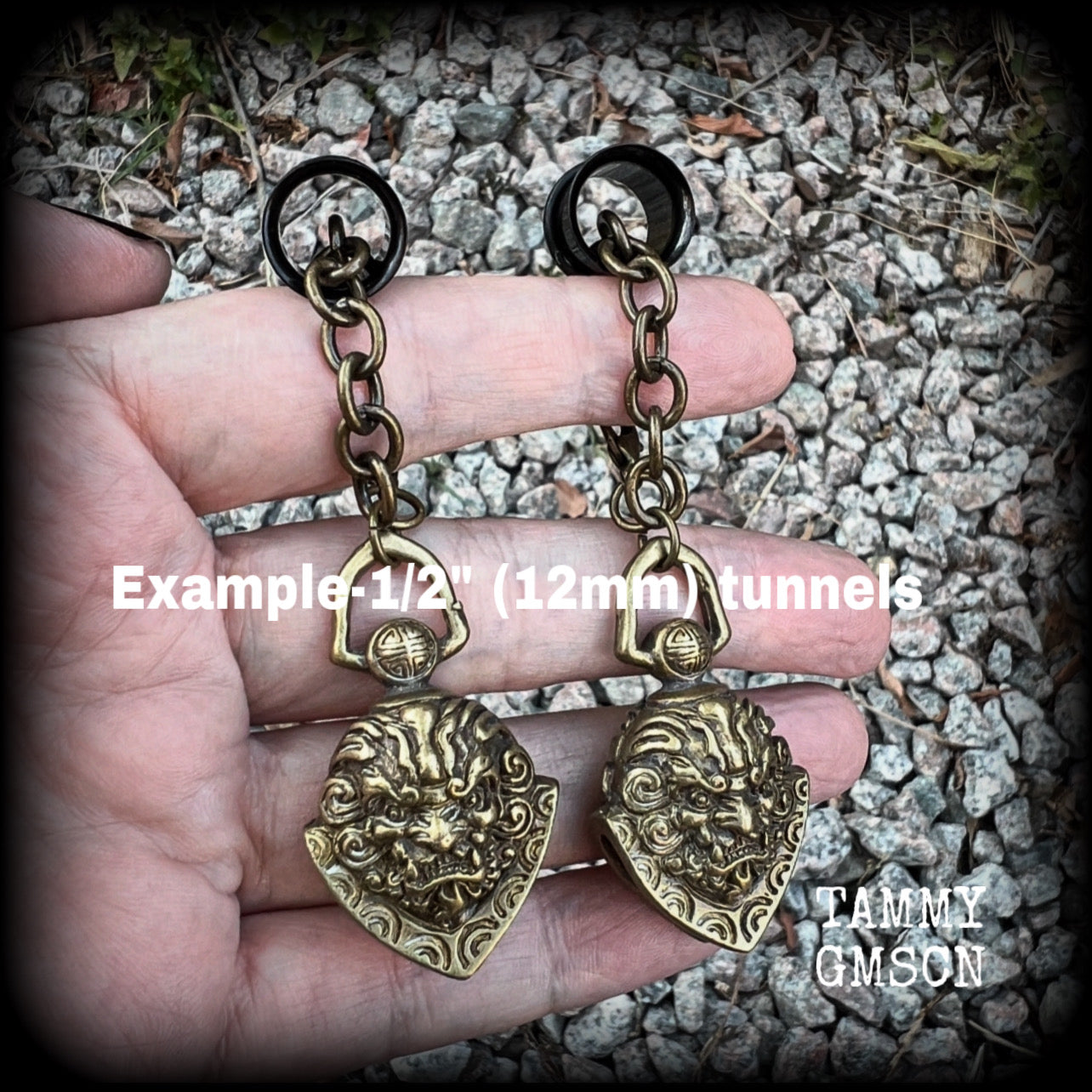 These unique tunnel dangles feature brass lion guardian bells, used in Tibetan Buddhism,  weighing approx 20 grams each, and measuring 8.5cms from tip to tip.  ✨ The ball inside the bell that rings has been disabled so these earrings wont make noise as you go about your day.