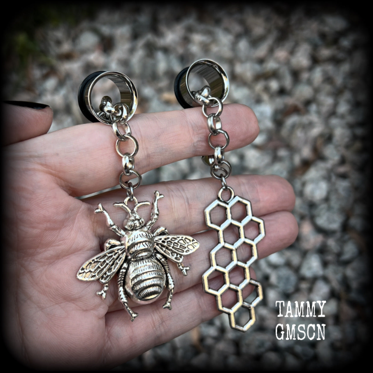 These gorgeous antique silver bee and honeycomb tunnel dangles are not too heavy and nice and dangly, weighing approx 8 grams each, and measuring approx 8cms from tip to tip.  🕷️ PLEASE NOTE-This particular chain will not fit through tunnels smaller than 00 gauge (10mm), though I have lots of different chains that will.  If you chose tunnels smaller than 00 gauge I will be in touch so you can choose a smaller chain.