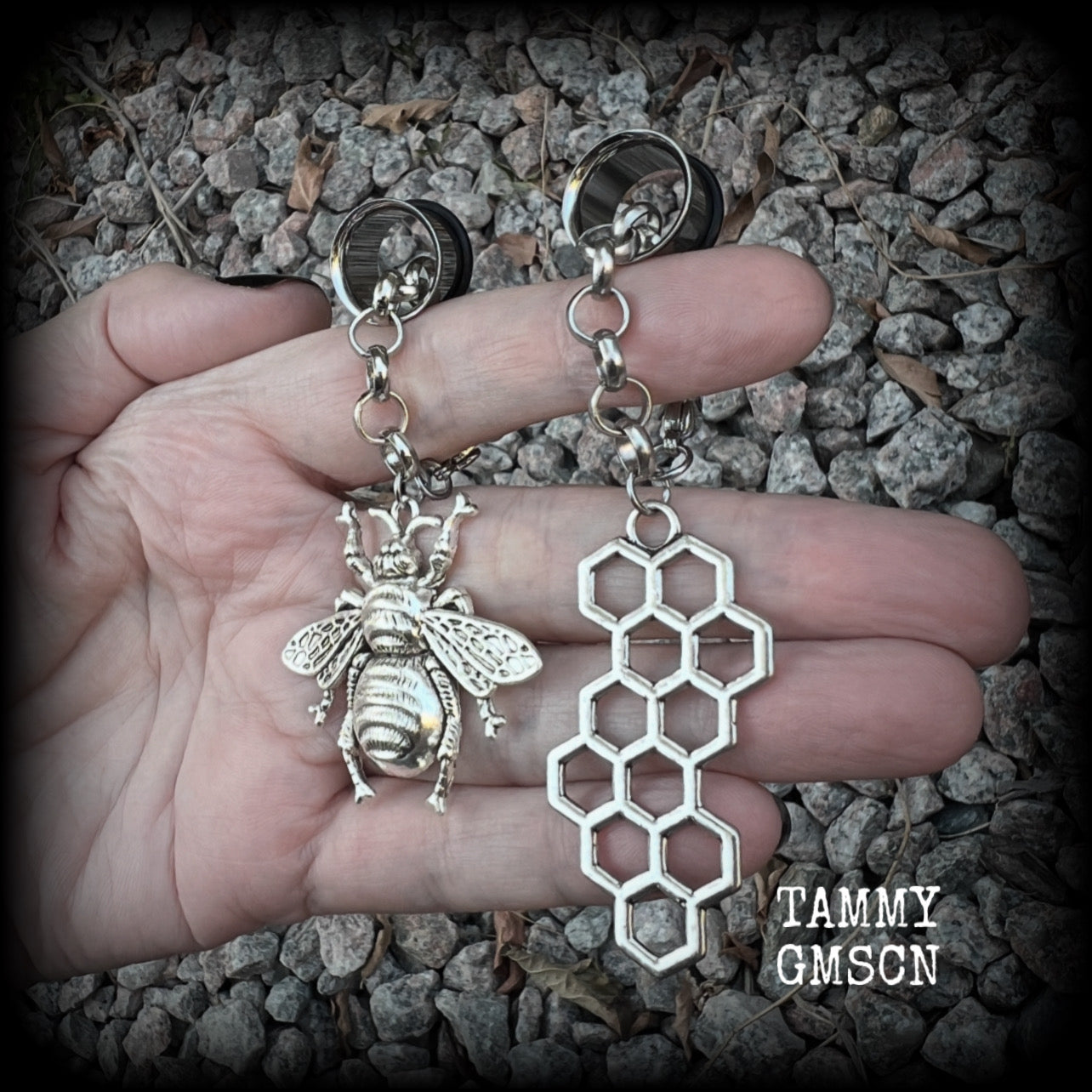 These gorgeous antique silver bee and honeycomb tunnel dangles are not too heavy and nice and dangly, weighing approx 8 grams each, and measuring approx 8cms from tip to tip.  🕷️ PLEASE NOTE-This particular chain will not fit through tunnels smaller than 00 gauge (10mm), though I have lots of different chains that will.  If you chose tunnels smaller than 00 gauge I will be in touch so you can choose a smaller chain.