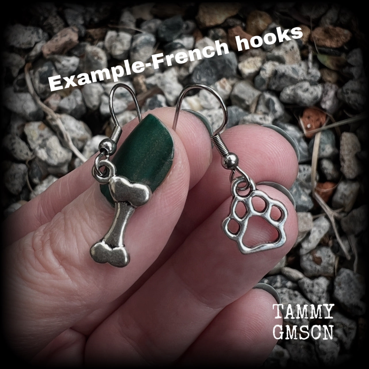 These adorable earrings feature cute classic antique silver dog bone and paw print charms, measuring just under 3cms from tip to tip, and weighing only a gram or two each.

This pair has been made with stainless steel french hooks, suitable for pierced ears.