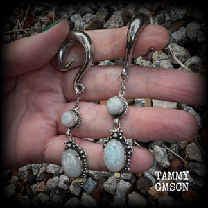 These beautiful boho Rainbow moonstone earrings are made with gorgeous polished gemstones, lovely and dangly measuring approx 8.5cms from tip to tip, and weighing approx 19 grams each.  These earrings have been made on 0 gauge (8mm) surgical steel full curl hooks, to be worn in stretched lobes.