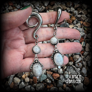 These beautiful boho Rainbow moonstone earrings are made with gorgeous polished gemstones, lovely and dangly measuring approx 8.5cms from tip to tip, and weighing approx 19 grams each.  These earrings have been made on 0 gauge (8mm) surgical steel full curl hooks, to be worn in stretched lobes.